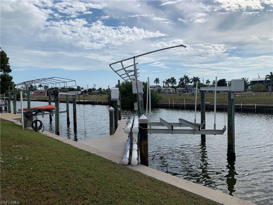 Tropical Waterfront Paradise on Pine Island!!!

Discover the ultimate island-vibe living with this beautiful SW facing 4103sf direct Gulf-access lot in St. James City on City Sewer & Water, perfectly positioned for world-class fishing, boating, and endless fun in the Florida sun. This property features two boat lifts, 8 & 10K lb. capacity, both with new motors, durable Trex decking, and a serene lanai with a sparkling plunge pool—ideal for cooling off after a day on the water. A charming entertainment space can accommodate a dining area and beautiful outdoor kitchen. 

This convenient location boasts quick boating access to open water, Pine Island Sound, Sanibel, Captiva, and Fort Myers Beach. Enjoy golf cart rides to Pine Island’s best restaurants, live music, and the laid-back coastal lifestyle the area is known for. 

Build your dream waterfront escape or enjoy the existing amenities immediately—this property offers the perfect blend of relaxation, recreation, and tropical beauty. The original manufactured home was demolished, saving buyers on the building impact fee, based on what they intend to build. The Sellers have installed 50 AMP RV hookups, and the existing electric power box is on site, saving buyers with costs to reinstall.

Live the island life… every day!