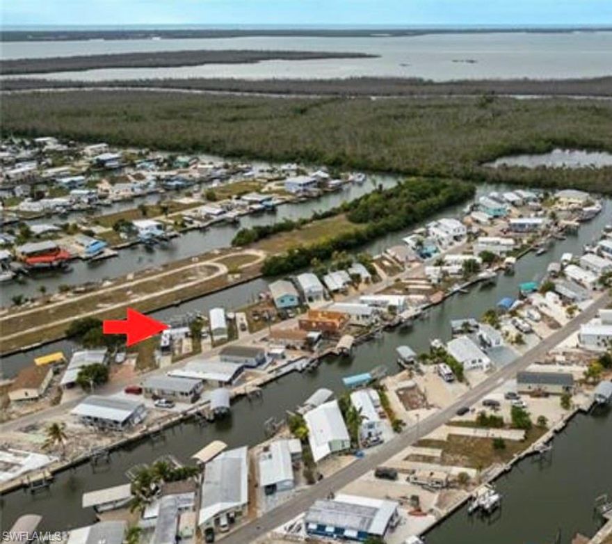 PRICE REDUCTION ON DIRECT GULF ACCESS WATERFRONT – Pool, Dual Boat Lifts, Seawall & Build-Ready – Just reduced to $359,900!!

Rare opportunity to own a direct Gulf-access waterfront property in St. James City, Florida with major infrastructure already in — saving significant time, cost, and permitting for your future build.

The previous home was lost to Hurricane Ian, offering a clean slate to design and build your custom elevated coastal home while benefiting from valuable existing improvements that are already completed.

Property features include:

• Solid seawall in great condition
• Two boat lifts (8,000 lb & 10,000 lb)
• Composite dock decking between lifts
• Direct boating access to open water
• In-ground swimming pool with pool heater
• Pool cage and spacious 12x28 lanai
• Epoxy flooring in lanai and around pool area
• Public sewer connection (no septic)
• 200 amp electric service
• 50 amp RV hookup

This is more than just a vacant lot — it is a waterfront lifestyle property with key improvements already in place. Avoid long construction timelines and rising costs associated with installing seawalls, docks, lifts, and utilities.

Build your elevated dream home to current codes and enjoy immediate access to boating, fishing, and Southwest Florida’s beautiful waterways right from your backyard.

Ideal for buyers seeking:
    •    Direct Gulf access
    •    Existing dockage and lifts
    •    Build-ready lot with utilities
    •    The ability to customize their own home

Located in a peaceful boating community known for world-class fishing, island hopping, and waterfront living.

Now Offered at $359,900