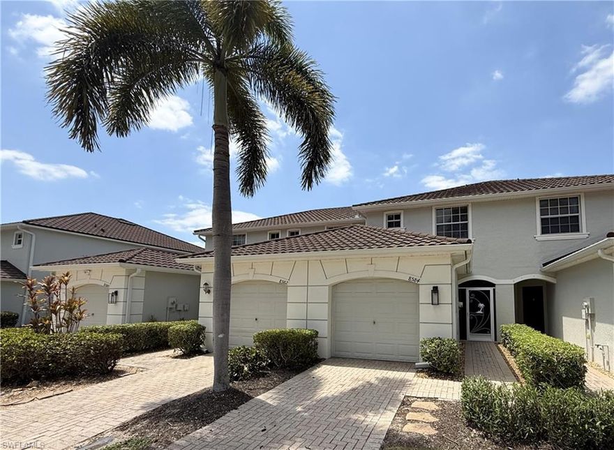 Beautifully upgraded and meticulously maintained waterfront townhome in the gated community of Olympia Pointe. Sold turnkey, this 2-bedroom, 2.5-bath townhome offers peaceful lake views, abundant natural light, and a warm, inviting layout that feels both comfortable and functional from the moment you enter.

The kitchen features granite countertops, wood cabinetry, and stainless steel appliances, opening into a spacious living and dining area with serene views of the lanai and water beyond. It’s a bright and welcoming space, perfect for everyday living or entertaining. The first floor also includes a half bath, generous storage, and an attached garage with washer and dryer for added convenience.

Upstairs, beautiful teak stairs lead to two private suites. The guest suite offers a walk-in closet and its own en-suite bath, while the spacious primary suite features dual walk-in closets and a beautifully finished bath with dual sinks, black quartz countertops, travertine accents, and relaxing waterfront views.

Step outside to the screened lanai and enjoy quiet mornings overlooking the lake in one of the most peaceful settings in the community. This is a rare opportunity to own a waterfront townhome in Olympia Pointe, with all the benefits of low-maintenance living in a well-kept gated neighborhood.

Olympia Pointe offers beautifully landscaped grounds and an impressive selection of amenities, including a clubhouse, fitness center, billiards room, community heated pool and spa, play area, and on-site management. Conveniently located minutes from Fort Myers with shopping & dining with easy access to I-75 to Fort Myers, RSW International Airport, and Naples.