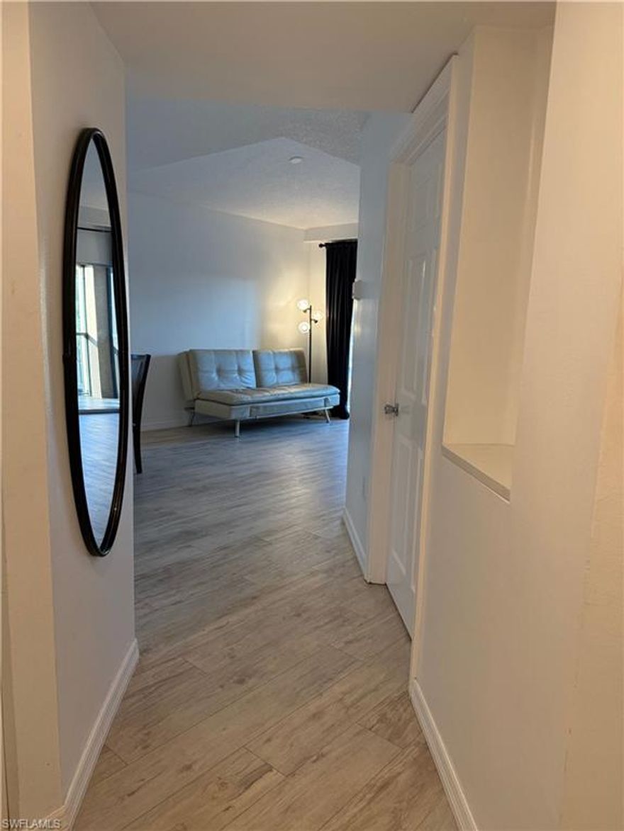 Welcome to this beautifully updated 1 bedroom, 1 bath third-floor condo located in the desirable Sanctuary at Imperial River community in Bonita Springs, Florida. This move-in-ready residence has been thoughtfully renovated with modern finishes throughout. Enjoy peace of mind with a brand-new AC unit (approx. $9,000 investment), along with new luxury vinyl plank (LVP) flooring throughout for a clean, contemporary look. The kitchen has been refreshed with updated stainless steel appliances and new quartz countertops, offering both style and durability. The renovated bathroom features elegant tile finishes, creating a spa-like feel. Step outside to your newly tiled patio, perfect for relaxing and enjoying the Florida breeze from this elevated third-floor vantage point.The Sanctuary at Imperial River offers a prime location close to shopping, dining, beaches, and all that Southwest Florida has to offer. Whether you’re looking for a full-time residence, seasonal retreat, or investment opportunity, this condo checks all the boxes.