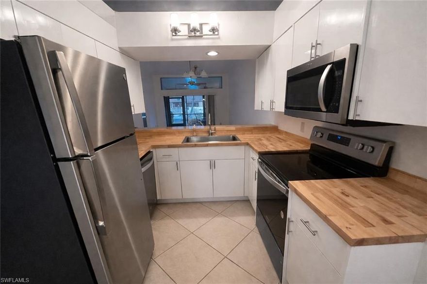 Welcome to this beautifully updated, rare outward-facing unit in the highly desirable gated community of Cinnamon Cove. Enjoy an abundance of natural light and peaceful green space views right outside your front lanai—plus the private pool specific to this quad is just steps from your door, offering the perfect blend of convenience and relaxation. This home features stylish butcher block countertops, all new appliances, and thoughtful upgrades throughout. Electric hurricane shutters provide added security and peace of mind, making seasonal living or full-time residence worry-free. This smart layout includes in-unit laundry conveniently located in the guest bathroom, maximizing space and functionality. Multiple closets including a massive walk-in closet are perfectly located in the primary bedroom. Whether you're looking for a primary residence, seasonal getaway, or investment opportunity, this property checks all the boxes.
Don’t miss your chance to own one of the best-located units in Cinnamon Cove—schedule your showing today!

Taxes Estimated at $2800 a year.