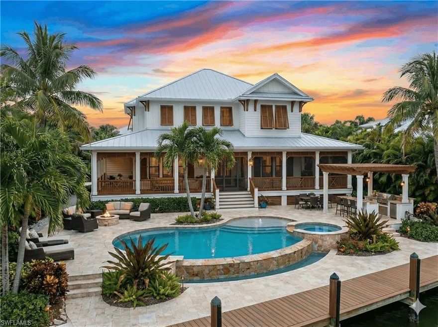 Exceptional waterfront homesite on Captiva Island presenting a rare opportunity to design and build a new elevated coastal estate. With approximately 100 feet of bay frontage on a generous parcel, this prime island setting offers deep water dockage, seawall and direct access to the Gulf of Mexico.  Prime location will accommodate larger vessels and sailboats. Truly ideal for the serious boater.
The property features a newer dock with space for multiple lifts, creating immediate functionality while future plans take shape. The existing single-level residence includes three bedrooms and three baths and reflects classic island character, with vaulted beamed ceilings, a striking rock fireplace, and an open floor plan that flows seamlessly to a spacious screened lanai. Renderings reflect a reimagined coastal retreat.
Outdoors, a private pool and spa overlook tranquil water views, offering a peaceful retreat surrounded by nature. Whether enjoyed as-is, held for investment, or transformed into a custom elevated waterfront estate, this parcel offers a rare combination of location, boating depth, and development potential, a rare Captiva opportunity.