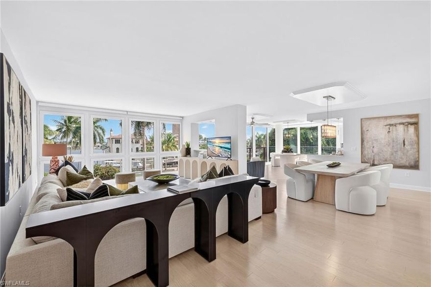 LOWEST PRICED 3 BED/3 BATH CONDO IN ALLEGRO!!! MOTIVATED SELLERS!!  Allegro is one of the few buildings in Park Shore to have an Aqua Fence to prevent future storm surge damage! Stunningly renovated, professionally furnished by Shawna Raff and a must-see! Light and bright, this beautifully updated 3rd floor Allegro condo features 3 spacious bedrooms and 3 full baths. The gorgeous kitchen is a true highlight, perfect for culinary enthusiasts. The living room offers the perfect balance of comfort, style, and entertainment. Large windows frame breathtaking views of Venetian Village, allowing natural light to flood the space while providing a serene, scenic backdrop. Experience the perfect blend of modern luxury and coastal charm in this beautifully updated property. Just steps from the beach and minutes from downtown Naples, this home offers the ultimate in convenience and luxury. Don’t miss out on this incredible opportunity to live in Park Shore!