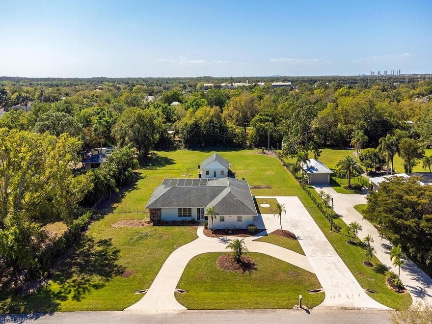 Single family pool home with large estate sized property located in the sought after heart of Estero, just off River Ranch Road. No HOA fees! The lot is 161 feet wide, by 296 feet deep. Long circular driveway leads up to this well maintained single family home. Two generous garage spaces are attached to the home, and a third garage bay is conveniently located behind the home in the separate workshop with overhead door. The pool area has paver deck, large covered lanai, outdoor shower, screen enclosure, shutters, and pool heater. Inside, the dining room and main bedroom have stackable sliding glass doors offering beautiful pool views. Large kitchen area with breakfast nook, pantry, long bar space, white cabinets, granite tops, and views to the pool area. Back yard is partially fenced in - making it pet/child friendly. Fantastic location between Corkscrew and Williams Road, close to Estero Community Park.