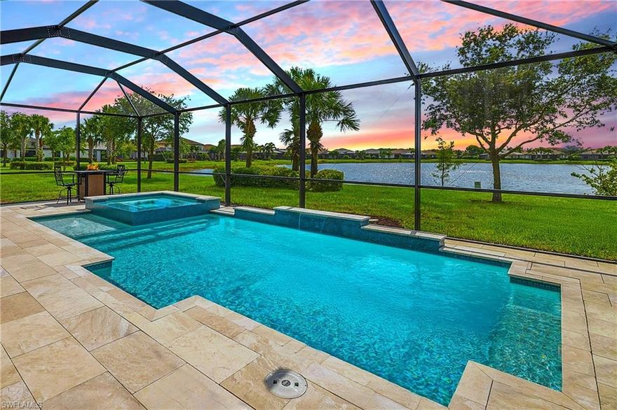 ENJOY SPECTACULAR SUNSETS OVER THE LAKE ALL YEAR LONG WITH THE WESTERN REAR EXPOSURE! MOVE IN RIGHT AWAY! DESIRABLE LAKEFRONT HOME WITH CUSTOM SALTWATER POOL & SPA AND SPARKLING WATER VIEWS IS AVAILABLE NOW IN THE PLACE AT CORKSCREW! This 2019 “Trevi” residence offers 3 Bedrooms + Den w/Glass Doors, 3 Full Baths, 2 Car Garage, 2,032sf living area. The outdoor space starts with the TRAVERTINE POOL DECK extending out 24 feet from the covered lanai. The CUSTOM POOL WITH CORNER SPA glistens when the water cascades over the modern teal glass mosaic tile onto the large SUNSHELF. The RAISED WALL adds an additional “POP” as a focal point with a sheer decent water feature. This deep homesite still provides plenty of room to add a fence beyond the screened pool enclosure for your kids and pets to play. The OPEN CONCEPT floorplan features 12” x 24” PLANK TILE, upgraded light fixtures and ceiling fans, REMOTE BLINDS ON SLIDERS, window treatments, CROWN MOLDING throughout the main areas and a DESIGNER GLASS DOOR INSERT.  The Greatroom boasts a striking STONE FEATURE WALL equipped with an LED FIREPLACE that is perfect to create a relaxing atmosphere. The Kitchen showcases White cabinetry, STAINLESS STEEL APPLIANCES, Granite Countertops, a WALK-IN PANTRY and a kitchen island for casual dining. The Dining area joins the Greatroom creating an inviting space for entertaining in the heart of the home while opening onto the covered lanai space.  The Primary Suite is appointed with a CUSTOM WOOD TRIM ACCENT WALL, dual closets and SPARKLING WATER VISTAS from your bedside. The Primary Bath boasts of double sinks, SOAKING TUB, SEPARATE SHOWER and a private water closet. Guests will enjoy accommodations in the split bedroom layout. One guest suite has it's own EN-SUITE FULL BATH for added privacy. WASHER AND DRYER included. PROPERTY IS HIGH AND DRY AND LOCATED IN FLOOD ZONE X... NO FLOOD INSURANCE REQUIRED! Amenities at The Place include: Resort Pool w/100' Waterslide, Indoor Restaurant, Bourbon Bar, Cafe, Outdoor Bar, Fitness Center, Movement Studio, Tennis, Pickleball, Bocce, Basketball, Playground, Dog Park, Childwatch, Spa Services. For GOLF ENTHUSIASTS, the highly rated Jack Nicklaus designed OLD CORKSCREW GOLF CLUB is open to the public and located directly across the street from the community entrance! NEW PUBLIX GROCERY STORE... JUST 1.4 MILES AWAY... IS NOW OPEN!!! TENANTS INCLUDE DUNKIN DONUTS, UPS STORE, LEGNO ITALIAN RESTAURANT, NAIL AND HAIR SALON, HEARTLAND DENTAL, AND MORE!