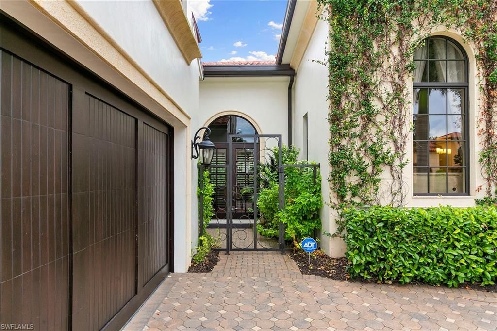 Photo of 2896 Tiburon BLVD E, NAPLES, FL 34109 (MLS # 225069896)