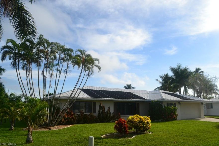 ATTENTION BOATERS, SNOWBIRDS & INVESTORS TOO !!! This 3 Bedroom 2 Bath Pool Home Offers Quick Water Access In One Of Pine Islands Destination Neighborhoods !!! Great Place To Park Your Boat, Spend 6 Months Of The Year Or Update And Resell. Extra's Include A Metal Roof, Solar Heat In The Pool, Covered Boat Lift, Pocket Doors To The Bedrooms. Wall Oven In The Kitchen And Plenty Of Closets And Storage Throughout. Call Today Before This One Is Gone !!!