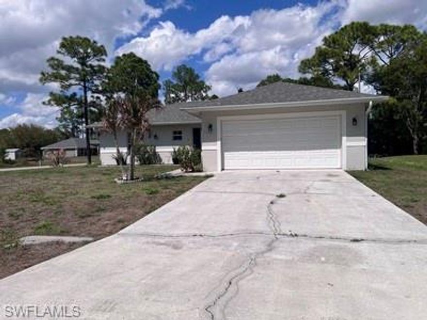 This spacious 3-bedroom, 2-bathroom home with a 2-car garage is available for rent in Lehigh Acres. Conveniently located near SR-82 and local schools, it offers easy access to commuting routes, shopping, and everyday essentials.

Designed with a great room layout, the home features an open living and dining area that creates a comfortable space for everyday living and entertaining. The home also includes a washer and dryer for added convenience.
The large master suite offers plenty of space along with a well-appointed master bathroom featuring a separate shower and bathtub, plus a private toilet enclosure for added comfort and privacy. Situated on a desirable corner lot, the property provides extra privacy and a large backyard—perfect for relaxing, entertaining, or enjoying the outdoors. Comfortable & private.
