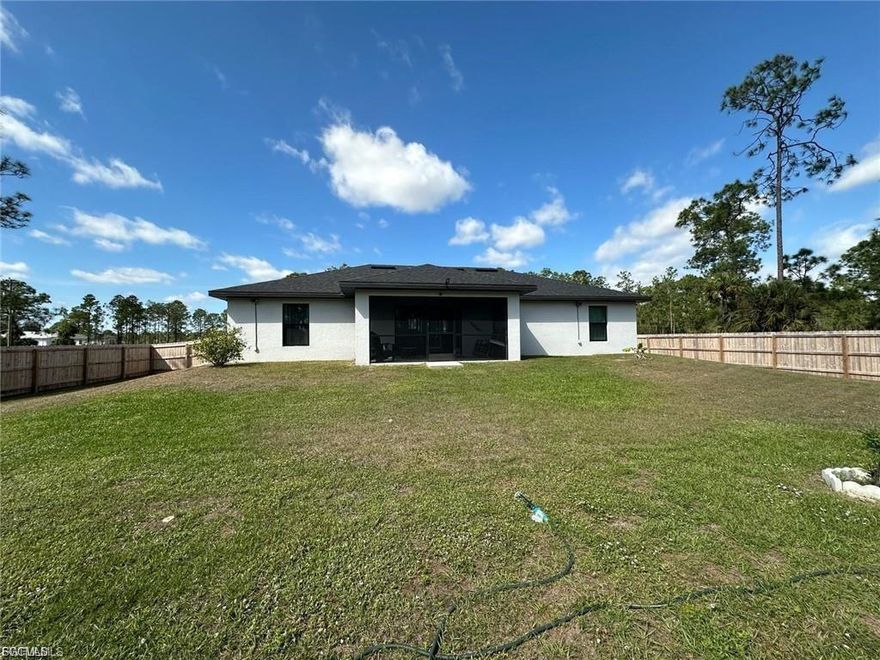 Welcome to your next chapter of luxurious Florida living in this meticulously curated residence, where comfort meets sophisticated design. This fully furnished sanctuary offers four thoughtfully appointed bedrooms and two elegantly designed bathrooms, creating the perfect canvas for both gracious entertaining and serene daily living. The jewel of this property lies in its generous lot dimensions, providing an expansive outdoor haven that beckons with endless possibilities. Whether you envision a resort-style pool oasis, a verdant garden retreat, or simply desire the luxury of space, this parcel delivers abundant opportunity for your creative aspirations to take flight. Situated in the burgeoning Lehigh Acres community, this residence benefits from its strategic proximity to essential amenities and recreational destinations. A mere stone's throw away, the Charlie R. Mathney Park offers a verdant escape for outdoor enthusiasts, while convenient access to Jack's Market ensures daily conveniences are within easy reach. The presence of respected educational institutions in the vicinity adds another layer of appeal to this already desirable location. The primary bedroom serves as a tranquil retreat, exemplifying the home's commitment to comfort and style. Each additional bedroom has been thoughtfully designed to provide private sanctuaries for family members or guests. The fully furnished status of this property presents an exceptional opportunity for those seeking a turnkey solution, with carefully selected pieces that complement the home's architectural character. Natural light cascades through strategically placed windows, creating an ambiance of warmth and welcome throughout the living spaces. The seamless flow between indoor and outdoor living areas speaks to the thoughtful design philosophy employed in this residence, making it an ideal setting for both intimate gatherings and grand entertaining. The property's location within Lehigh Acres positions residents to enjoy the best of Florida living, with easy access to cultural attractions, dining establishments, and the region's celebrated outdoor activities. This home represents more than just a residence; it's an invitation to embrace a lifestyle where luxury, comfort, and convenience converge in perfect harmony. For the discerning buyer seeking a fully appointed residence with generous proportions and endless potential, this property presents an exceptional opportunity to establish roots in one of Florida's most promising communities