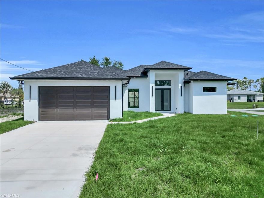 Beautiful new 2026 construction corner home featuring 3 bedrooms and 2 bathrooms, centrally located for ultimate convenience. This modern residence offers sleek finishes throughout, an open-concept layout, and a stylish outdoor kitchen—perfect for entertaining and enjoying Florida living at its finest. A spacious master bedroom designed for comfort and elegance. The open layout flows seamlessly into a large walk-in closet, offering generous storage with custom shelving and plenty of space to stay organized . A stylish double-entrance shower features two open access points, creating a seamless, walk-through design that enhances both convenience and elegance. Book your showing today .