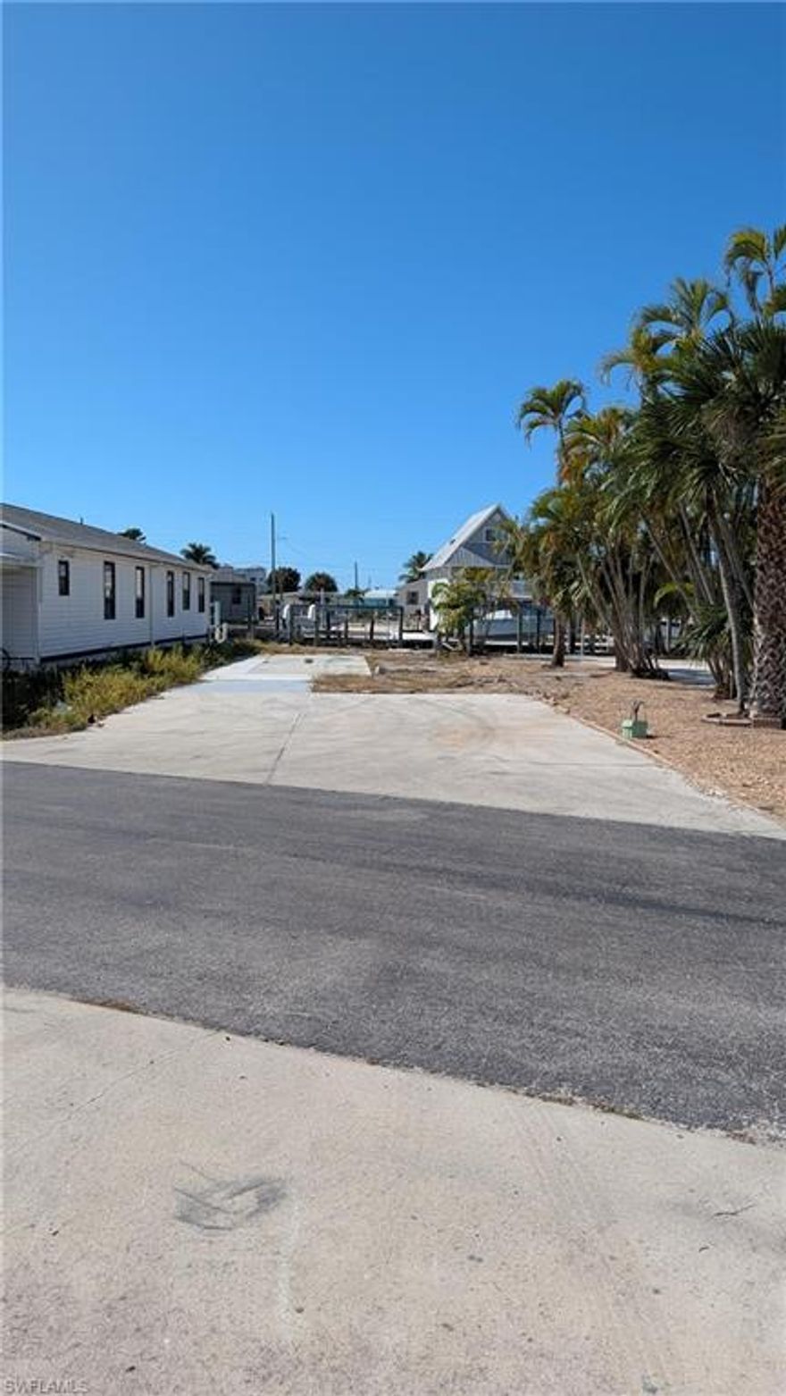 Discover coastal living at its finest with this charming lot located in Fort Myers Beach, FL. It is being sold with 59 nancy lane giving the owner close to 70 feet frontage for multiple boats and toys