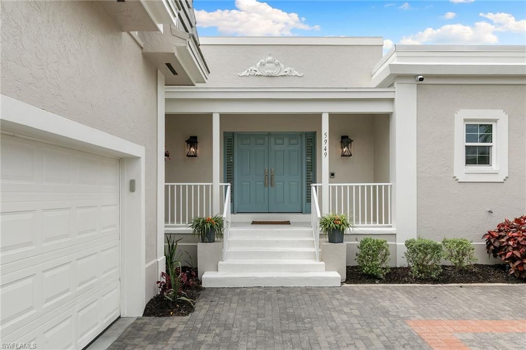 Photo of 5949 Chanteclair DR #8, NAPLES, FL 34108 (MLS # 226011567)