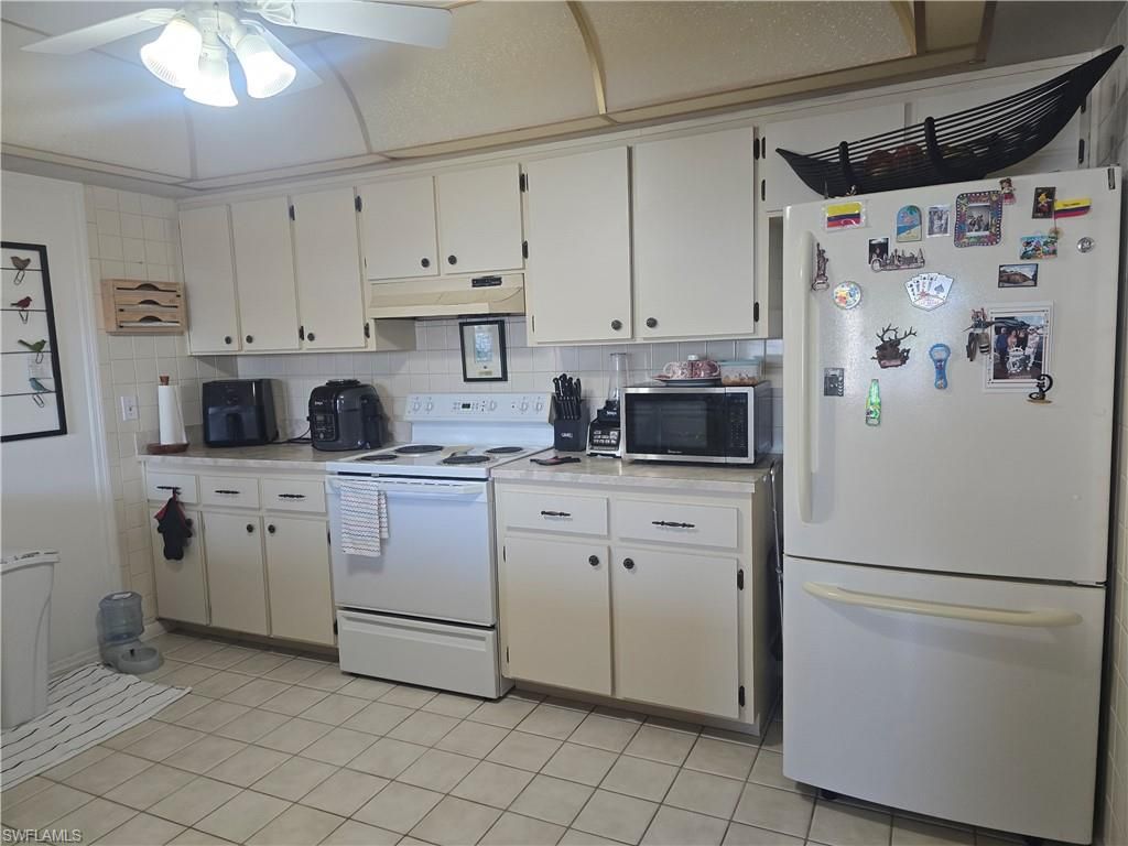 Photo of 4472 30th PL SW, NAPLES, FL 34116 (MLS # 226015921)