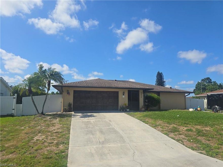 Unique Split-Plan Living with a Private Primary Wing! Unlock the potential of this versatile Golden Gate City home! Featuring a 3-bedroom + den layout with a 2-car garage, this property is perfect for an owner-occupant or a savvy investor. The primary suite offers a "home within a home" feel with a private entrance, living area and attached den.
This 3-bedroom plus den residence features a rare layout perfect for multi-generational living or a quiet home office setup. Arrive through the screened front porch and double doors into a welcoming foyer that leads to a great room and kitchen—the heart of the home.
The primary suite is a true sanctuary, featuring a private den and sitting area with its own dedicated entrance from the lanai. Two guest bedrooms are tucked away on the opposite side of the home for maximum privacy. Outside, the covered and screened lanai overlooks a fully fenced backyard, complete with a 10x24 detached shed (installed 2021) featuring AC—ideal for a workshop, studio, or extra storage. The house has well water, septic system,  a 2018 roof, and a fully fenced lot with a gate on each side of the house, the heavy lifting is done. Located minutes from shopping, community center, and Paradise Coast Sports Complex, this property is ready for your personal touch.