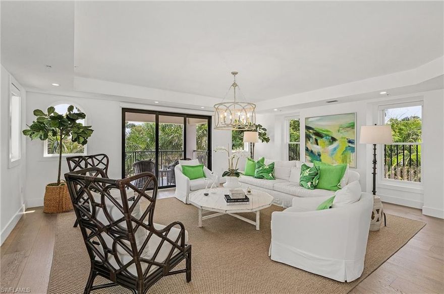 Welcome to Esmeralda on 8th, a boutique luxury condominium of only 6 units in the heart of Olde Naples. Walking distance to fantastic restaurants, shopping, Cambier Park, Naples Bay, Third Street South, & fabulous white sand beaches. Meticulously maintained, this elegant space with quality construction provides the perfect floor plan for full or part time living. Offering favorable lease terms for additional income. This penthouse unit lives like a single family home, w/ an appealing open concept great room that is flooded w/ natural light. Enjoy the Florida lifestyle while stepping onto multiple airy balconies w/ blue sky & tree top views. All this overlooks your private salt water pool surrounded by lush landscaping, set in a completely enclosed courtyard w/ private entry. Luxurious wide plank oak flooring, custom built closets, exquisite furniture package & more. Expansive owners' suite w/ Juliet balcony, private desk area, & an opulent bathroom retreat that's enveloped in marble finishes, exude elegance and functionality. Large guest rooms with beautiful ensuite baths, private elevator, secure building, 2 car attached garage w/ additional parking spaces. Available immediately!