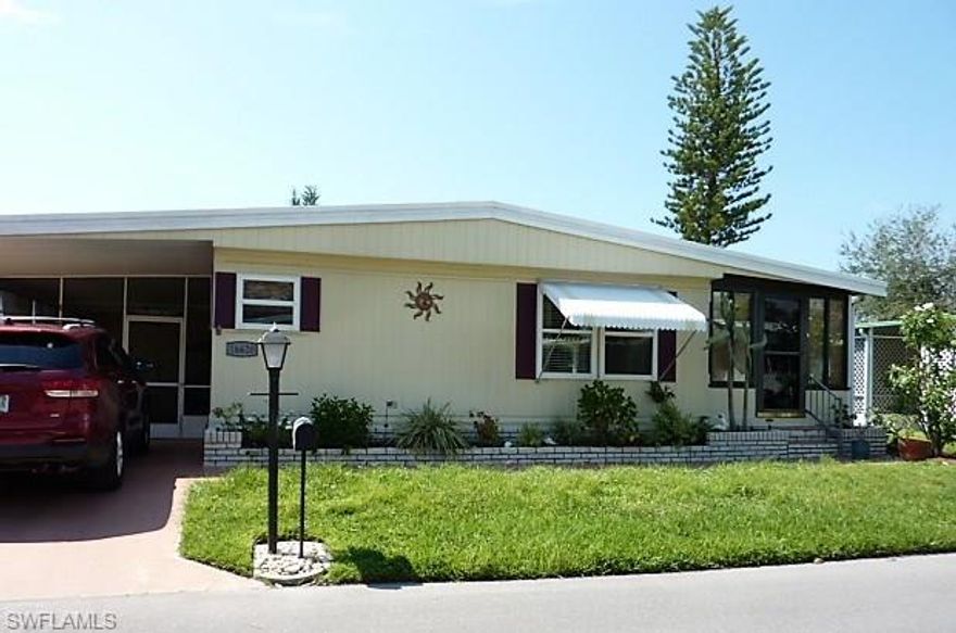 Great opportunity to own a slice of paradise! Nicely kept, clean & updated home in Tropicana - a resident owned 55+ community perfectly located near white sand beaches of Sanibel & Ft Myers. Relax and live well in over 1200 sqft under air in this 2 bed/2 bath home including Florida room, plus a large screened lanai and extended shed with laundry and work shop.  AC is two years new, freshly painted interior with wood laminate floors, most windows newly replaced, new refrigerator, kitchen sink & disposal. Both baths have new showers and updated vanities, and widened doorway in guest bath (for wheelchair access).  Each roomy bedroom has a walk-in closet. Updated PVC plumbing and all overhead vents. Pick honeybell oranges & lemons in your back yard by the cutest rock garden.  Home has been lovingly cared for by owners for 9 years.  Tropicana has two heated pools, sundecks and hot tub, clubhouse equipped with kitchen, theater, library, free wifi, billiard room & stage. Arts & crafts, social functions, shuffle board & bowling leagues, dances, bingo and tons of fun activities.  Even a storage area for your boat & RV.  Come live the good life!