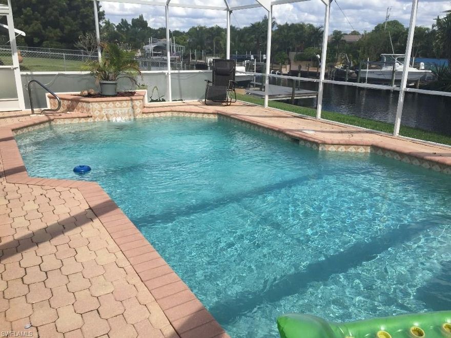 Bottom line price!!!  If home does not sell by 10/14/16...Owner take home off the market!!!  This home has been completely refreshed and is easy to show/view.  New Paint inside, New Carpet, New Stainless Steel Appliances, Floor tile professionally cleaned, and landscaping spruced up. Roof was replaced in '04, Plumbing in '12, Dock/Boat lift '13 and Pool Installed in '02 as per Lee County Records.   Come see this outstanding Gulf Access home with Circular Driveway, Pool/Spa, Great Room, Boat lift and more...not many left in this price range.  Please note, home was rented for $1700/monthly and has the potential to get more now.  Great Investment opportunity or an affordable opportunity for the new Home Owner.  Definitely worth your time.