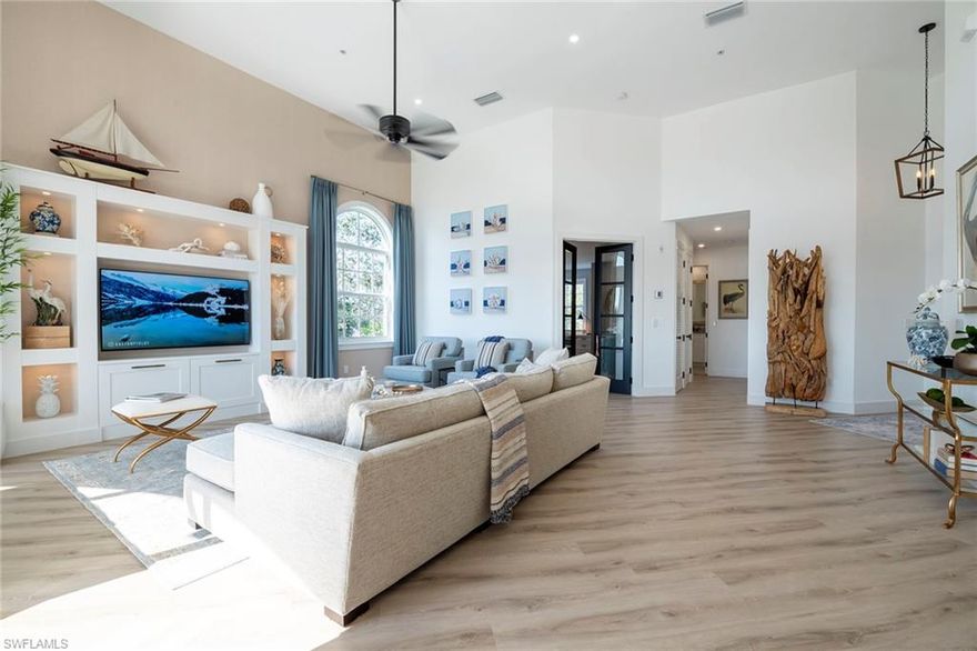 AVAILABLE SEASON 2027 with a 3-month minimum.  Meticulously remodeled in 2022 - no detail was spared!  This 2/2 condo + Den is located in the amenity - rich, guard-gated North Naples community of Pelican Marsh.  With 1,866 sf of living space, this end unit has loads of light from its south facing wall of windows.  The great room with its 14' ceilings (no neighbor above you) wood-look floors, and a coastal feel sets the scene for the classic comfort that is yet to come: a well-appointed eat-in kitchen; a separate dining area near the screened lanai; comfortable outdoor seating area and a split floor plan for privacy. Overlooking the golf course, you'll find the Primary Suite with a king-sized bed, a writing desk, a spacious closet with built-ins and an en-suite bath with a walk-in shower and double vanity. On the North side, you'll find a second bedroom with an Olympic Queen size bed, a nearby 2nd bath with a shower/tub combination, and a large den with glass double doors, a queen sleeper-sofa, wall - mounted TV and a second desk. The unit has a 2 car-garage with elevator access to your floor.

Pelican Marsh offers an array of amenities such as, tennis + pickleball courts, a state-of-the-art fitness center. and beautifully landscaped walking/bike paths throughout.  The community of Clermont features its own community pool and outdoor grill area.