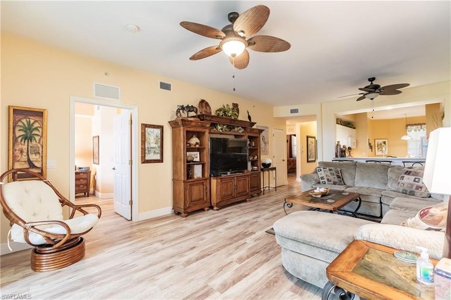 Spectacular panoramic views of the golf course and sunsets from your 3rd floor TURNKEY, GOLF condo!!This beauty offers easy to maintain new wood style vinyl flooring in 2020!! Updated microwave, refrigerator and dishwasher and new AC and Water Heater in 2020!! Phantom screen door that invites the Florida warm breezes and largest master bath of all the condos offering separate his and her vanities. Sit back and relax on your enclosed lanai with acrylic sliders that allows for comfort year round and beautiful water and golf course views!!This is a golf membership condo with no cart or green fees and low taxes making it one of SWFL's best kept secrets. The Legends is a prestigious private country club offering a 30,000+ clubhouse w/ fine dining, sports pub & a gorgeous outdoor sunset grill!! Tons of amenities to choose from too, such as tennis, bocce, pickle ball, multiple pools & an exercise center/aerobics room w/ tons of classes to choose from.. everything from pilates and yoga to meditation and water aerobics!! Resort Style Living to it's finest, move in ready and waiting for you to call it home!!