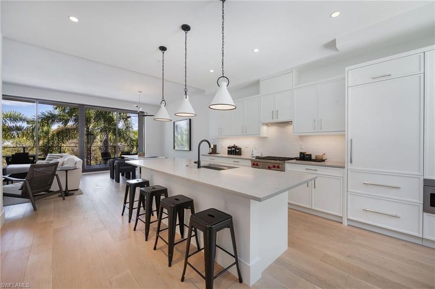 Experience refined coastal living in this sophisticated 2-bedroom, 2-bath residence at Eight Fifty Central, an intimate 22-residence building ideally situated in the heart of Olde Naples, just west of US-41. Built in 2021, this home showcases a fresh, contemporary design paired with the ease of a low-maintenance lifestyle. Light-filled interiors are complemented by wide-plank flooring and a thoughtfully designed layout that maximizes both comfort and functionality. At the center of the home, a stylish kitchen with natural gas cooking, premium appliances, and an oversized island opens seamlessly to the main living space, creating an inviting setting for both entertaining and everyday living. Clean architectural lines, quality finishes, and a split-bedroom floor plan enhance the overall sense of privacy and flow. Residents enjoy a boutique living experience with secure lobby entry, elevator access, assigned garage parking, and a resort-style pool with outdoor grilling rooftop. Located just moments from Fifth Avenue South, Third Street South, and Naples’ renowned white sand beaches, this residence offers convenient access to fine dining, boutique shopping, art galleries, and year-round events. Whether as a full-time residence, seasonal escape, or investment opportunity, this property captures the essence of effortless Naples living.