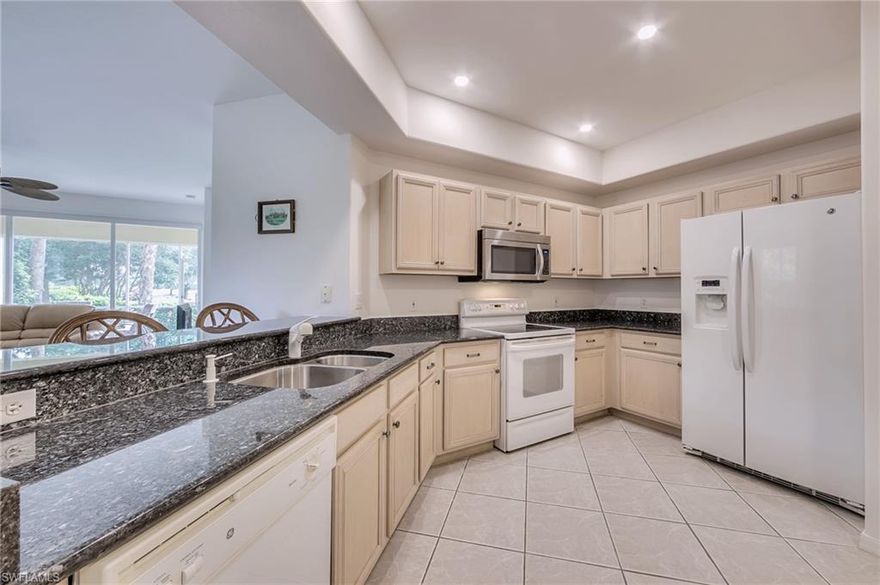 NEW ROOF & AC!! "Jasmine" Ground Floor END UNIT Condo, 2 BD/2BA + DEN, TURNKEY FURNISHED in Spring Run at The Brooks, a BUNDLED GOLF COMMUNITY! Upgrades include, New AC (Oct 2, 2019), New Roof, Neutral Tile on the Diagonal throughout main area, newer carpet in Bedrooms & Den, Tiled Lanai, Granite Kitchen Counters, & Every room & Closet Freshly Painted!! You'll love the popular "Jasmin" floor plan, Spacious Great Room, Light and Bright End Unit with lots of windows & lots of storage too! Screened & Tiled lanai for you to enjoy watching the golfers on the green at hole #18.  Low maintenance, ready for you to move in! Great Location, Short walk to the Club House!  The Club House offers Fine Dining, Grill & Bar, Pro Shop, Fitness Room, Library, Pool & Spa, and Lighted Bocce & Tennis Courts.  Memberships available to Private Beach Club, Spa & Fitness Center, Enrichment Center & The Rookery Restaurant. SPRING RUN is an ACTIVE, FINANCIALLY STABLE COMMUNITY offering a WIDE VARIETY OF AMENITIES AND SOCIAL ACTIVITIES. Prime Location: 20 minutes to SWFL International AIRPORT & the BEACHES, 1 mile from The Coconut Pointe Mall for great Shopping, Restaurants & Entertainment. See this one Today!