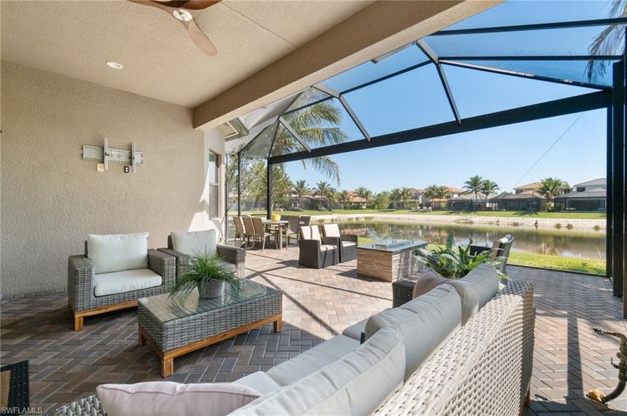 Picture-Perfect Water Views & Luxury Living in Stonecreek!

Welcome to 4409 Aurora Street, a move-in ready, like-new, 4-bedroom,
3-bathroom single-story home designed for those who appreciate the
relaxed yet refined Naples lifestyle. Every detail of this home is
flawless, blending coastal design with modern luxury, from the
recently upgraded, high-end porcelain tile flooring in a timeless neutral
palette, to the custom crown molding and shiplap accents that add
warmth and sophistication.

The sought-after Tribeca floor plan offers an open layout, seamlessly
connecting the formal dining area, gourmet kitchen (including gas
stovetop-a rarity in SWFL), and inviting family room, where
hurricane-impact sliders bathe the space in natural light. Every
corner of the home feels fresh, bright, and brand new—a true retreat.

Step outside to the extra special picture-window screened lanai, where
serene views set the stage for ultimate relaxation. A natural
gas stone fire table adds ambiance and retractable slider screens for
open-air enjoyment. Whether sipping your morning coffee, creating a
safe play space for children, or toasting to a glowing Naples sunset+moonrise,
this expansive lanai is pure perfection.

Inside, the flexible 4th bedroom with a closet allows for a guest
suite, home office, or cozy den—tailored to your needs. A thoughtfully
upgraded master closet system ensures exceptional organization making
the storage as functional as it is stylish. Impact-resistant windows
and doors throughout offer peace of mind, energy efficiency, and
year-round comfort. Plus, with no flood zone concerns, a 24 hour manned gate, lawn care & irrigation included, you can enjoy stress-free living.

Beyond the home, Stonecreek offers over 6 acres of truly resort-style
amenities and elevates
everyday living.
Enjoy two resort-style pools with a tiki hut, shade cabanas, spa, a splash park,
state-of-the-art fitness center, five lighted Har-Tru tennis courts, four separate pickle-ball courts, indoor+outdoor basketball courts, fitness class studio, professionally designed social room + kitchen, billiards game room, fenced playground & more! An elite lifestyle campus wouldn't be complete
without a Social Director coordinating endless opportunities for fun.

When it’s time to explore town, you’re just minutes from dining, and entertainment—with an easy bike ride to Sprouts, Aldi, Chick-fil-A, local breweries, and public golf courses. Plus,
Fort Myers International Airport (RSW) is less than 30 minutes away,
making travel effortless.

Now's your chance to be a Florida resident, owning a pristine, completely upgraded,
and move-in-ready residence in one of Naples' most sought-after
communities, zoned for top-rated A schools.

Schedule your private showing today and experience extraordinary!