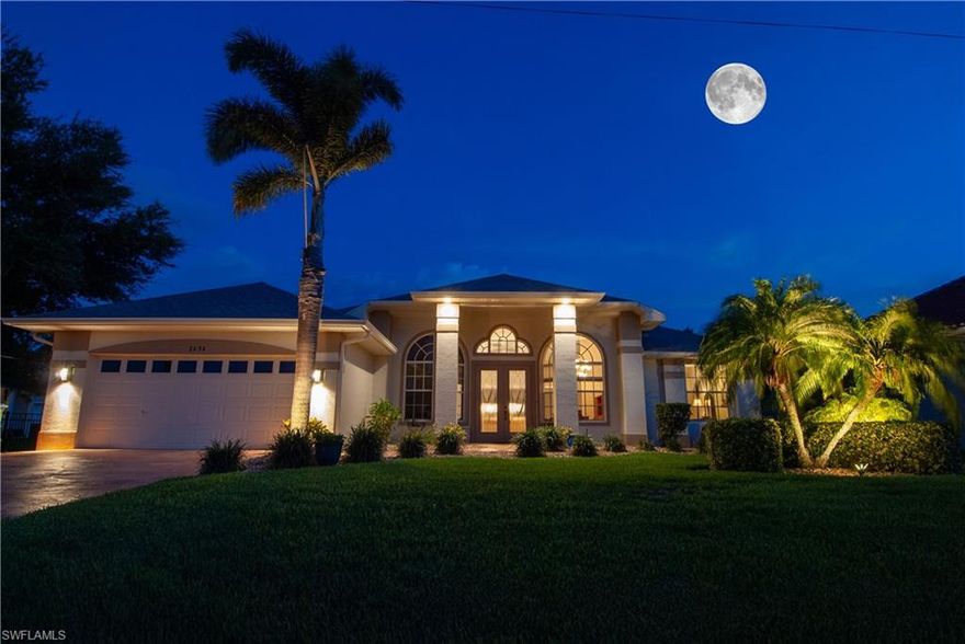 Lakefront Paradise in SW Cape Coral. Welcome to your dream waterfront retreat in the heart of Southwest Cape Coral, Florida. This stunning lakefront home offers unparalleled views and luxurious living, perfect for those seeking both relaxation and elegance. Location: SW Cape Coral, a highly sought-after area known for its serene waterways and proximity to amenities. Lot Size: Generous lot with direct lake frontage, offering privacy and stunning views. Home Size: Spacious 3 bedroom, 2 bathroom, and office/den residence designed for comfort and style. Outdoor Living: Expansive covered lanai with retractable sun screens, sparkling pool with waterfall, spacious sundeck, and outdoor shower. Ideal for entertaining or simply unwinding while enjoying breathtaking sunrises and sunsets with highly desirable rear southern exposure. Evening ambiance is captured with wonderful front and rear landscape lighting with an array of color selections to suit your mood or holiday celebration. Lifestyle: Convenient access to boating, water activities, beaches, and fine dining. Interior Features: Open-concept floor plan with high ceilings, gourmet kitchen equipped with modern appliances, luxurious master suite with lake views and direct pool access, and tasteful finishes throughout. Community: Access to community amenities including parks, golf courses, and shopping centers, all within close proximity. Recent updates: State-of-the-art LG & GE appliances, newer carpeting, water heater, air conditioner, ROOF, exterior & interior paint, upgraded pool cage, and master suite with custom closets & spectacular bathroom remodel. Why SW Cape Coral? SW Cape Coral is renowned for its tranquil atmosphere, abundant wildlife, and easy access to Gulf beaches. Whether you enjoy boating, fishing, or simply relaxing by the water, this location offers the quintessential Florida lifestyle. Don't miss out on this rare opportunity to own a slice of paradise in SW Cape Coral. Schedule your private tour today and experience the beauty and serenity of lakefront living firsthand. CITY WATER & SEWER ASSESSMENTS IN AND PAID-IN-FULL. FYI, OWNER'S FLOOD INSURANCE POLICY IS TRANSFERABLE