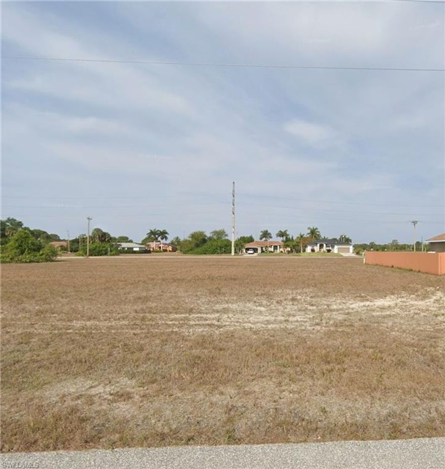 Build your home on this 0.23-acre residential lot in the growing community of Cape Coral. This property features paved road access and offers a convenient location near schools, shopping, dining, and major roadways. With plenty of space for a custom home and outdoor living, this lot presents a great opportunity for homeowners or investors alike.
