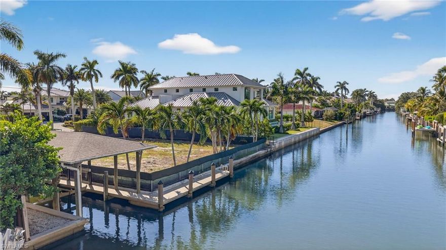 An exceptional opportunity awaits in the prestigious waterfront community of Aqualane Shores. This rare .30-acre cleared homesite sits directly on a picturesque canal offering direct Gulf access with no bridges—a true boater’s paradise in one of Naples’ most sought-after luxury neighborhoods.
Design and build your custom estate on this prime waterfront setting, where wide canal views, quick open-water access, and a serene coastal atmosphere create the ideal backdrop for the ultimate Naples lifestyle. With generous dimensions and an enviable location including an existing dock and covered boatlift, the property offers limitless possibilities for crafting a world-class residence with dockage, outdoor living spaces, and resort-style amenities. 
Perfectly suited for boating and water-sport enthusiasts, the homesite offers effortless navigation to Naples Bay and the Gulf of Mexico. Aqualane Shores residents enjoy an unparalleled balance of privacy, prestige, and convenience, all within biking distance to the beach and steps from 3rd Street South’s famed dining, boutiques, and cafés. The energy of 5th Avenue South—with its world-class shopping, galleries, and entertainment—is just moments away.
Opportunities of this caliber are increasingly rare. Secure your piece of Naples waterfront paradise and create the custom home you’ve always envisioned in one of the city’s most coveted coastal communities.