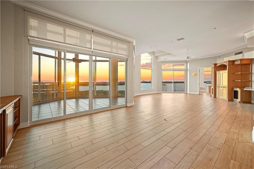 BONITA BAY PENTHOUSE ALERT! Rarely available PENTHOUSE on the 12th floor in BAYVIEW II SOUTH, COMPLETE WITH ONE OF THE LARGEST OVERSIZED PRIVATE GARAGES, measuring 30’ deep by 25’ wide. 
THE BEST UNIT in the building, the VIEWS ARE STUNNING. Complete with TWO large lanais DIRECTLY WEST FACING, THE SUNSETS ARE UNMATCHED AND COMPLETELY UNOBSTRUCTED! Views from every room, you’ll marvel at the sunsets from the TOP FLOOR complete with large picture frame windows in the living room for unbeatable views. 
The kitchen was updated in 2021 complete with quartz countertops, high grade cabinets, new living room paint 2025, updated floor title and a brand-new bedroom AC late 2025. 
Bayview II exterior was recently painted (August 2025) and is complete with a NEW ROOF (March 2025). With only 50 units, the building is EXTREMELY WELL RUN, and the long serving, full-time building manager is always willing to help to make your day and living experience stress free. A tranquil pool, community room, and private gym await, and because Bayview II only has 50 units, it’s like having your own private amenities. 
If you love stunning TOP FLOOR views, 4801 Island Pond CT #1202 is for you. BUY THE VIEW and bring your personal touches to call this BONITA BAY property, home. Residents of Bonita Bay enjoy 12 miles of walking/ biking trails, bocce, outdoor gym, pickleball, tennis, canoe/kayaking, boat launch, and three on site parks, as well as a BRAND-NEW private beach park with in-season shuttle all included in the HOA. OPTIONAL membership to Bonita Bay Club, one of Southwest Florida's premier golf communities, offering an active country club lifestyle, five of championship golf courses and state-of-the-art amenities