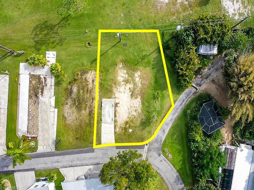 Amazing lot in desired Mariner's Cove in Estero, FL.  This lot is steps away from the Estero River.  It is a vacant lot so build your dream home in a boating community with low HOAs.  You own the land here!!!  Previous home has already been removed saving you a substantial amount of money upfront.  Community pool, clubhouse, boat ramp, library, common laundry and much much more.  A great waterfront, 55+ community in Estero convenient location to airport, shopping and beaches.