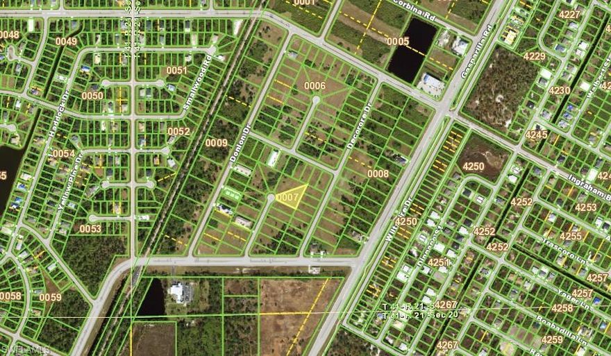 Vacant oversized multi-family residential lot located in a quiet neighborhood in Rotonda Lakes. Build your dream home or take advantage of a great investment opportunity. Conveniently close to area beaches, shopping, and dining.