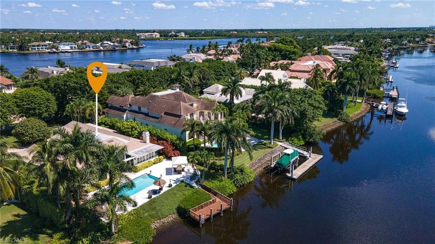 Exquisite Port Royal estate pool home, nestled along the highly sought-after Galleon Drive, offering incredible wide water Western sunset views, and unobstructed access to the Gulf. Can accommodate 55 ft boat, 1000 yards to the beach. Bright and sunny interior showcasing exceptional "old world" architectural detailing with classic and comfortable furnishings. Gourmet kitchen, stainless steel appliances, granite countertops, marble and wood flooring, bedrooms have carpet. The pool was professionally refinished in 2021, and a new 24x24 marble tile deck has just been installed, along with a brand-new pump and heater, creating a pristine and fully updated outdoor oasis. Easy walk or bike to the beach or 3rd St. Experience boutiques and top-tier restaurants along the coveted 5th Ave and 3rd St. S., and Naples' pristine, white sandy beaches, just moments away. Experience the epitome of luxury living in Port Royal, just steps from the newly reimagined Port Royal Club—now under construction and poised to become one of the most exclusive, architecturally significant beachfront clubs in the country. This residence is eligible for Port Royal Club membership. The redesigned Club will offer world-class amenities including Gulf-front dining, elevated fitness and wellness facilities, private poolside cabanas, and refined social spaces that enhance the unparalleled coastal lifestyle Port Royal is known for. This coveted location provides exceptional walkability, premier beach access, and the prestige of living within Naples’ most elite waterfront enclave. Opportunities in this area are exceedingly rare and highly sought after.