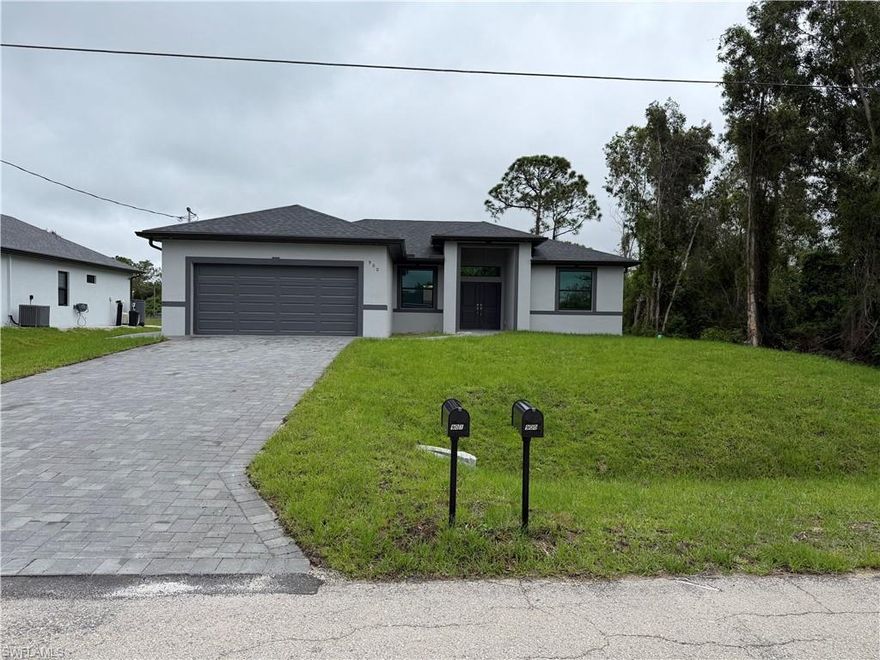 Brand New 4 bedrooms 2 Baths home close access to I-75 and many new development happening in Lehigh Acres.  Impact Windows and Doors, Modern Accents, Quartz Counters on kitchen, laundry and vanities.  Backs up to fresh water canal for greater privacy.
Seller offering a two year extended home warranty.  See the house and make it your home.