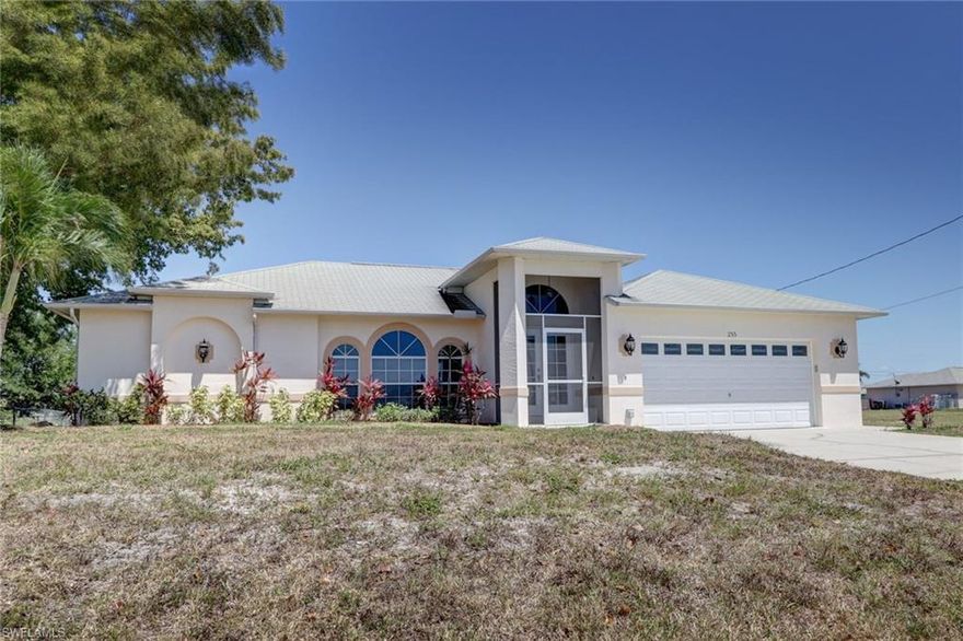 Perfectly located within minutes to Golf courses, Jim Jeffers Park, and the amazing restaurants Matlacha has to offer, this home is a must see! Move in ready 3/2 with tile throughout and carpet in the bedrooms. The enclosed Florida room opens right up into the living room, providing extra space for entertaining. The guest bath is set up for pool access if you plan on adding one in the future. Dual sinks and granite counter tops, along with his and hers walk-in closets in the master bedroom. Very functional layout for a growing family in a quite neighborhood. Make sure to contact your Realtor today for your own showing!