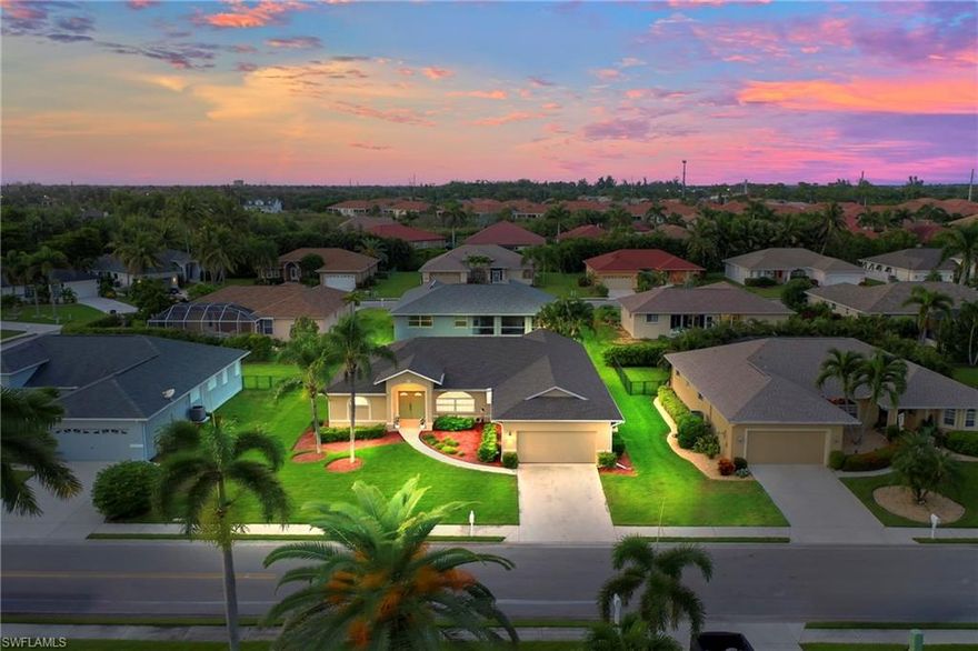 ENJOY ADDED PEACE OF MIND with no history of water intrusion from storms AND transferable flood insurance!  Vaulted ceilings, triple-panel sliders, and a lanai designed for Florida sunshine living—welcome to 8886 Staghorn Way in the desirable Fernwalk community. This 4-Bedroom residence spans over 2,400 sq. ft., offering a thoughtful mix of open gathering areas and private retreats.  A double-door entry with decorative fanlight windows, pendant fixture, bullnose corners, and architectural pony wall sets the stage. Inside, neutral tones and recessed lighting create an inviting canvas. Hardwood, tile, and carpet add texture and comfort throughout.  The kitchen is the hub of the home, featuring rich cabinetry, a breakfast bar, walk-in pantry, and eat-in nook. The living room opens effortlessly to the screened lanai through triple-panel sliders, creating the perfect setting for entertaining or relaxing.  The split-bedroom floor plan provides privacy, highlighted by a spacious primary suite with dual walk-in closets, spa-style bath with dual sinks, soaking garden tub, separate shower, private water closet, and an arched transom window that fills the space with natural light. A front room with arched windows offers versatility for use as a den, office, or formal dining.  Fernwalk is an established neighborhood of just 68 homes. Amenities include a pool and cabana, tennis, bocce, volleyball, and basketball, along with sidewalks throughout the community. An extended sidewalk along Winkler connects directly to Summerlin Road’s bike path for walking, jogging, or biking. Centrally located in South Fort Myers, this address is minutes to Sanibel, Fort Myers Beach, shopping, dining, airports, and interstates—an ideal balance of comfort and convenience.