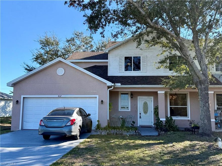 This beautifully maintained 3-bedroom, 2.5-bath townhome in Lehigh Acres offers a bright, open-concept layout ideal for comfortable living and entertaining. The main level features spacious living and dining areas filled with natural light, durable wood-look flooring, and a well-appointed kitchen with ample cabinetry, generous counter space, and modern appliances. Enjoy a fenced-in backyard, perfect for pets, play, or relaxing outdoors. Upstairs, the primary suite provides a private retreat with an en-suite bath, while two additional bedrooms offer flexibility for family, guests, or a home office. Major upgrades include a new roof installed in 2025 and a recently replaced well system within the past few months, offering peace of mind for years to come. Additional highlights include in-unit laundry, a one-car garage, and low-maintenance living. Conveniently located near shopping, dining, schools, and major roadways, this move-in-ready townhome is an excellent opportunity for homeowners and investors alike.