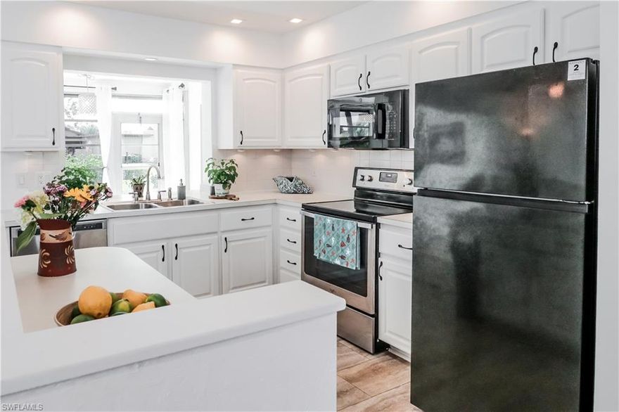 MOVE In Ready! FURNISHED 2+Den/1 & 1/2 Bath, 1 car Garage Cream Puff well-kept Attached Villa! Low Fees $191 A month. Immaculate and clean villa - owner pride shows! Updated AC, Roof 2018, Villa new Re-Pipe 2020 and nice updates to the bathrooms and floors in 2021. New tar roof over garage 2023 permits applied and in process of closing with county. Just a block from 18 hole public Golf Course (optional to join) along with lakewood Pool (Optional Membership to the golf or Recreational options of Lakewood is available separately if desired). Pets allowed. Easy to rent for seasonal income. Close US41 with Sugden Regional Park, New Town Centre Publix next door, Food Truck Park nearby, and 4 Miles to the beach of downtown 5th Ave Naples!