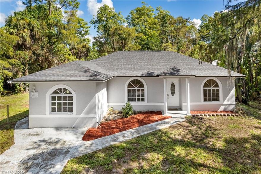 Great PRICE and NEW Roof 2022! New Paint and New Appliances! No Damage from Storm - Safely located in Golden Gate Estates! You will love the Loads of Space in this multi-generational living home! 2000 Sq. Ft All Tile with mother in law suite inside home! Huge 2.27 Acres Lot with tons of SPACE for your toys and future guest house or workshop for business! You won't want to miss this beautifully landscaped, private, fenced lot with room for a pool. The future is here on everglades blvd with new shopping at the corner and Elementary School just a few streets away. Your new home awaits, come see this property today and explore the possibilities!