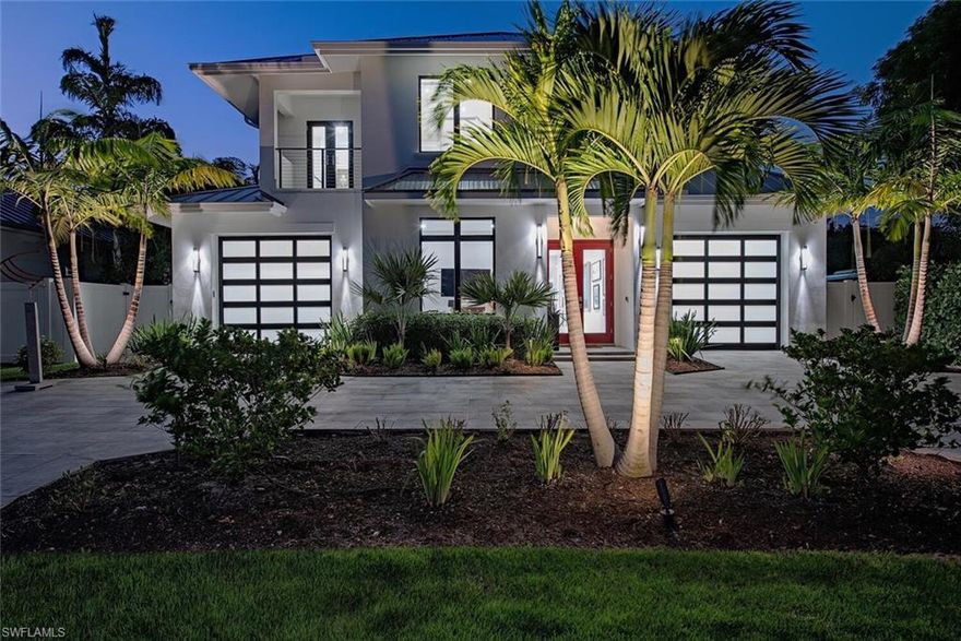 Welcome to an exceptional 2022 custom built Old Naples residence situated on a quiet street in the heart of town within close proximity to 5th Avenue/3rd St shops and dining, sugar sand beaches, NCH, and many more amenities.  This transitional clean lined cottage style home was impeccably built by InnerSpace and offers extraordinary fit and finishes throughout. The plan offers just shy of 5,000 square feet of air conditioned living space, 5 en suite bedrooms + study including a separate guest cabana, 2 garages, gas heated saltwater pool/spa, large covered outdoor kitchen with grill and fire place conveniently protected by screens and shutters.  Some of the features include first and second floor concrete wall construction, air conditioned garages, wide plank white Ash wood flooring throughout main house, natural gas supply, gourmet kitchen and service pantry area with Wolf/Sub Zero/Perlick/KitchenAid appliances, automated privacy shades, and a rare generous fenced in rear yard space.  An absolutely superb Old Naples home offering unrivaled value.