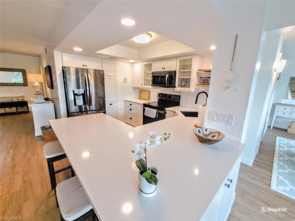 Photo of 5830 Trailwinds DR #813, FORT MYERS, FL 33907 (MLS # 2025018150)