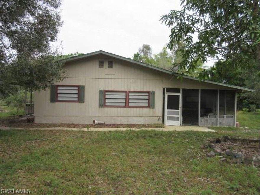 Room to roam in Fort Myers!  This 5 bedroom, 2 bath home is nearly 3000 square feet and sits on 5 acres, some of it with groups of trees and some of it open for gardening or building something fun!  This is located in the Orange River Ranchettes area and has so many possibilities for a creative home owner!  Looking for quiet or looking to spread out, you have both here with this property!  Schedule your showing today!