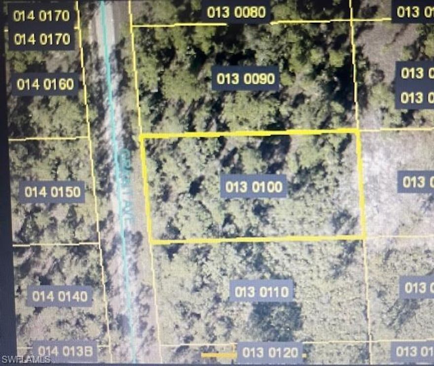 Almost a 1/2-acre lot is priced to sell and ready for you to build your dream home in beautiful Southwest Florida. With no HOA, you have the freedom to design and build exactly what you want. Conveniently located near several restaurants, and shopping, this property offers both privacy and accessibility. RSW Airport is just a short drive away. This lot provides endless possibilities.