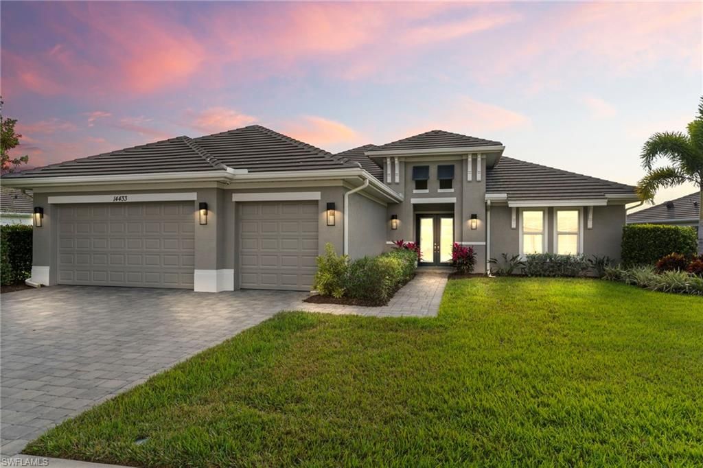 Photo of 14433 Neptune AVE, NAPLES, FL 34114 (MLS # 225084134)