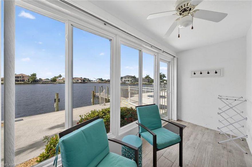 WATERFRONT living meets the ultimate boating lifestyle in this beautifully REMODELED FIRST-FLOOR condo overlooking the stunning panoramic waters of Bikini Basin. Located in the highly sought-after YACHT CLUB AREA this move-in-ready, TURNKEY FURNISHED residence offers DIRECT SAILBOAT GULF ACCESS with BOAT SLIPS just minutes to the Caloosahatchee River and open water.

Inside, you’ll find a thoughtfully updated living space featuring a bright open floor plan, contemporary coastal finishes, and SPECTACULAR WATER VIEWS throughout. The renovated kitchen showcases stone countertops, recessed lighting, plank tile flooring, a deep stainless-steel sink with gooseneck faucet, and a sleek Whirlpool appliance package including side-by-side refrigerator, smooth-top range, built-in microwave, and dishwasher.

The spacious primary suite is a true retreat with breathtaking BASIN VIEWS, a large walk-in closet, and an updated private bath featuring a tiled walk-in shower with glass enclosure, modern vanity, and plank tile flooring. The guest suite is equally inviting with its own walk-in closet and nearby updated guest bath finished in cool coastal tones.

The enclosed lanai is where this condo truly shines, featuring impact-resistant windows and screens so you can enjoy year-round sunsets and sparkling waterfront views in comfort. Step outside to your private patio with direct access to the HEATED COMMUNITY POOL and available boat dock. Additional features include a full-size washer and dryer, walk-in owner’s storage closet, updated plumbing, newer high-efficiency A/C system, newer hot water heater, and impact windows for peace of mind.

Coral Cay Condos is a well-maintained low-density waterfront community offering a heated pool, renovated clubhouse, BBQ area, shuffleboard court, extended community dock, and up to three parking spaces including guest parking. Short-term rentals are permitted up to three times annually with 30-day minimum stays, making this an exceptional seasonal residence, winter retreat, or investment opportunity.

Perfectly positioned within walking distance to downtown Cape Coral’s entertainment district, restaurants, farmers markets, festivals, and waterfront events, while offering quick access to Fort Myers via the Cape Coral Bridge.

If you’ve been searching for a low-maintenance Florida waterfront escape with direct boating access, stunning views, and true move-in-ready convenience, this is the opportunity you’ve been waiting for.