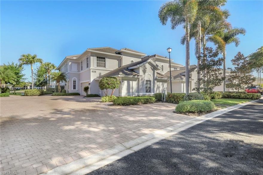 Enjoy breathtaking expansive lake and sunset views from this beautifully designed coach home in Paloma at Palmira Golf & Country Club. With amazing views from this elevated unit, abundant natural light, and a bright open-concept layout, this residence delivers the ideal Southwest Florida lifestyle for full-time living, seasonal enjoyment, or investment use.

This spacious home offers 2,082 square feet of living space and features 3 bedrooms plus a den, which functions as a true 4-bedroom layout, along with 2.5 baths. The newly remodeled kitchen is a standout, showcasing crisp white cabinetry, modern finishes, and an open design that flows seamlessly into the main living areas—perfect for entertaining and everyday living. The home is has an option of be furnished or unfurnished (negotiable) with the property and includes a brand-new A/C unit installed in 2024, as well as electric hurricane shutters for comfort and peace of mind.

Step onto the screened lanai and take in the incredible panoramic lake views and unforgettable sunsets, creating a serene indoor-outdoor living experience. Additional highlights include a two-car garage, an additional deeded parking space, and generous space for hosting family and guests.

Palmira is one of the area’s most sought-after resort communities, offering an exceptional lifestyle with a resort-style pool, fully staffed state-of-the-art fitness center, community center, library, business center, concierge services, tennis courts with an on-site professional, bocce, putting green, and a 27-hole championship golf course complete with a pro shop, grill room, and elegant country club.

Ideally located just minutes from Barefoot and Bonita Beach, consistently ranked among the top beaches in the country, and conveniently close to RSW International Airport, as well as premier shopping and dining throughout Southwest Florida.

This lakefront carriage home offers stunning views, thoughtful upgrades, and resort-style amenities—an exceptional opportunity in the heart of Bonita Springs.