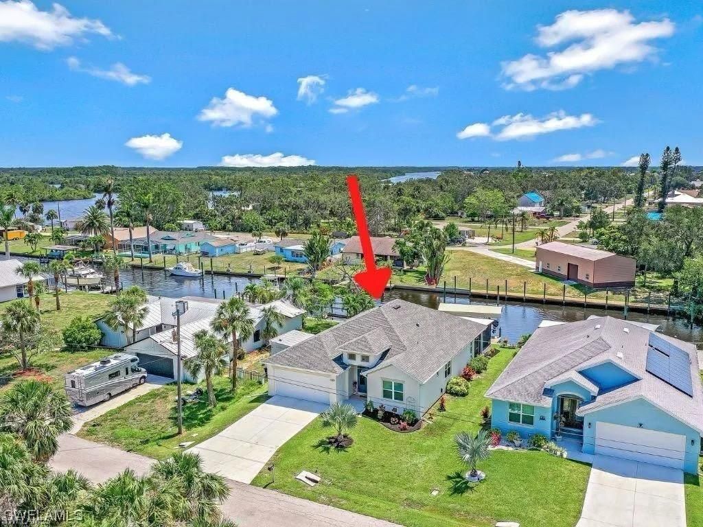 Photo of 2214 Isle Of Pines AVE, FORT MYERS, FL 33905 (MLS # 226018060)