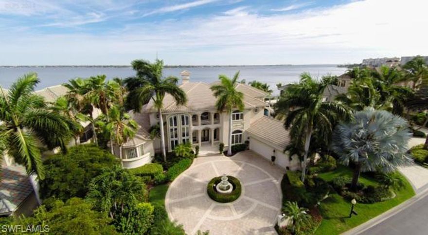 A masterfully designed estate located along a premier beach front stretch in exclusive Gulf Harbour Yacht & Country Club. This beautiful residence captivates w/awe inspiring water views, impressive design, attention to detail and its sheer size and grandeur. Notable highlights of this exceptional property are too numerous to capture in writing and include first and second floor master retreats, state of the art media room, waterfront study, private observation decks, a luxe multilevel pool and spa area w/lounge and barbecue area and lush tropical gardens. Nowhere else in Gulf Harbour does a home, that is currently available, offer so much in amenities, size and quality.