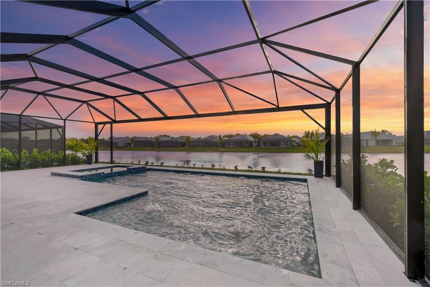 The only boating access western exposure Pallazio model under $2M currently for sale in Esplanade Lake Club!  Now offered fully furnished with a modern design aesthetic, this rare 4 bedroom + den, 3225 square foot home built in 2024 is located on the Grande Canal, allowing for boating on Lake Como right from your backyard! The heart of the home centers around a light-filled great room, with coastal wide-plank flooring, tray ceiling detail, and custom lighting. Thoughtful design seamlessly blends living spaces and dining areas into an inviting space ideal for social gatherings or tranquil evenings. The chef’s kitchen features top-of-the-line appliances, natural gas cooking, ample preparation spaces with large center island, and upgraded cabinetry.  Fully-pocketing sliding doors open to the extended lanai with upgraded leathered-marble large-format tile, and picture-window screen enclosure.  This backyard oasis is designed for both relaxation and entertainment. The well-equipped outdoor kitchen features a gas grill and hood with full-height tiled wall, refrigerator and sink. The custom pool with Baja shelf and spa beckons you to enjoy a refreshing dip or a serene float under the sun. Buyer may add a private boat- already prewired for electric and water.  With western sunset views, this outdoor space is a spectacular haven.  This residence boasts four well-appointed bedrooms and 3 full baths, plus a versatile den, perfect for a home office or an additional flex/guest room. The primary bedroom with water-view bay window upgrade is a retreat unto itself, with a luxurious en-suite bathroom, spacious multi-head shower, designer tile work, dual sinks, water closet, and large custom-finished closet. Additional home features include epoxy-finished extended two-car garage, impact windows and doors, custom millwork and wall features, designer lighting and new furniture package. Move-in ready and pre-wired for the dock installation, a discerning buyer can expect immediate enjoyment of this Florida waterfront lifestyle. Esplanade Lake Club features superb amenities including a boat launch on the 400+ acre lake, pool, spa, fitness center, tennis, pickleball and bocce courts, and walking trails. The clubhouse features a beachfront outdoor bar and grille, and a lakefront promenade with sunset views. Esplanade Lake Club is minutes from Gulf Coast Town Center, Coconut Point, and Miromar Outlets. World-class beaches, JetBlue Park, Hertz Arena, and southwest Florida International Airport are just miles away. Furniture included. Listing agent can provide a boat tour of the community!