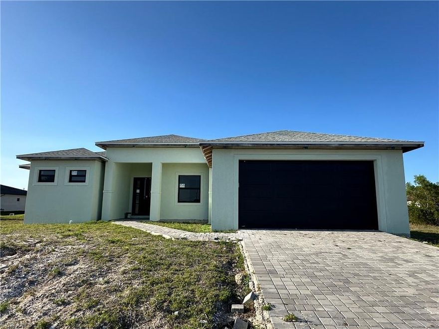 Unfinished new construction opportunity being sold as-is in the growing NW Cape Coral area, offering 1,918 sq ft of living area with a 3-bedroom plus den, 2-bath, 2-car garage layout. Buyer will need to complete remaining construction and permitting requirements.

Designed with a spacious great room floor plan, this home features a coffered ceiling in the main living area along with additional tray ceiling details and crown molding in multiple other rooms, creating a strong architectural foundation for a modern finished product.

Kitchen is equipped with shaker-style cabinetry and quartz countertops already installed. Dining area includes a matching built-in buffet with wine storage. Primary suite offers walk-in closets and a bathroom layout designed for dual vanities, a soaking tub, and a walk-around shower. Den includes a closet and can function as a fourth bedroom. Guest bathroom provides convenient access to the large covered lanai, allowing it to function as a future pool bath.

Tile flooring runs throughout, and impact-rated doors and windows are already installed. Garage door is in place, and a large laundry room includes a utility sink.

Exterior features include a spacious under-truss lanai with paver decking and space designated for an outdoor kitchen, along with a paver driveway. Septic system and drain field have been installed, with remaining items to be completed.

Located in NW Cape Coral with convenient access to Burnt Store Rd and Punta Gorda, the property is positioned near ongoing development in the Seven Islands area and future recreational amenities. Nearby parks, shopping, dining, and everyday services are all within a reasonable drive.

Agents, please read confidential remarks.